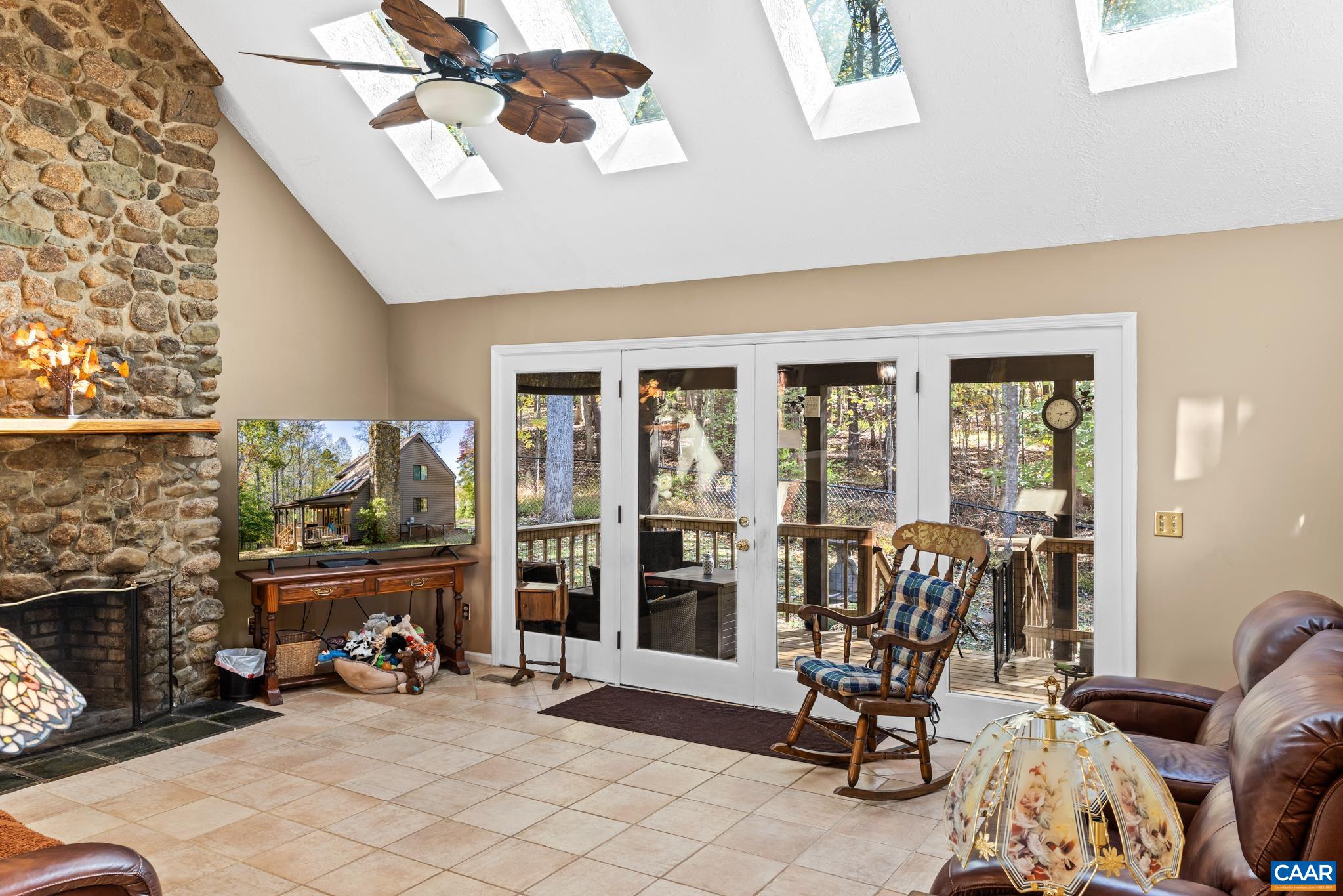 2530 Gillums Ridge Lane Charlottesville, VA 22903 - Photo 20 of 45 a view of a livingroom with furniture and a large window