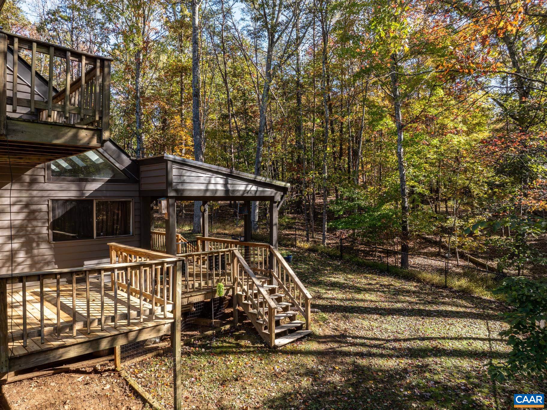 2530 Gillums Ridge Lane Charlottesville, VA 22903 - Photo 36 of 45 a view of a house with large trees