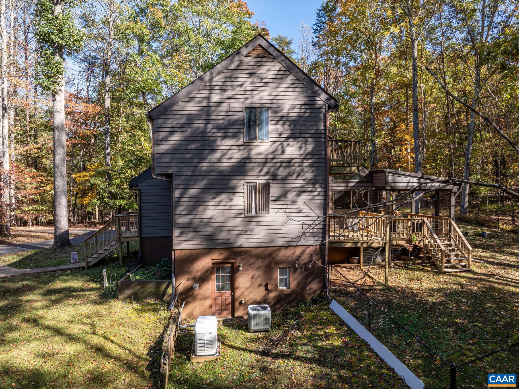 2530 Gillums Ridge Lane Charlottesville, VA 22903 - Photo 37 of 45 a view of house with a yard