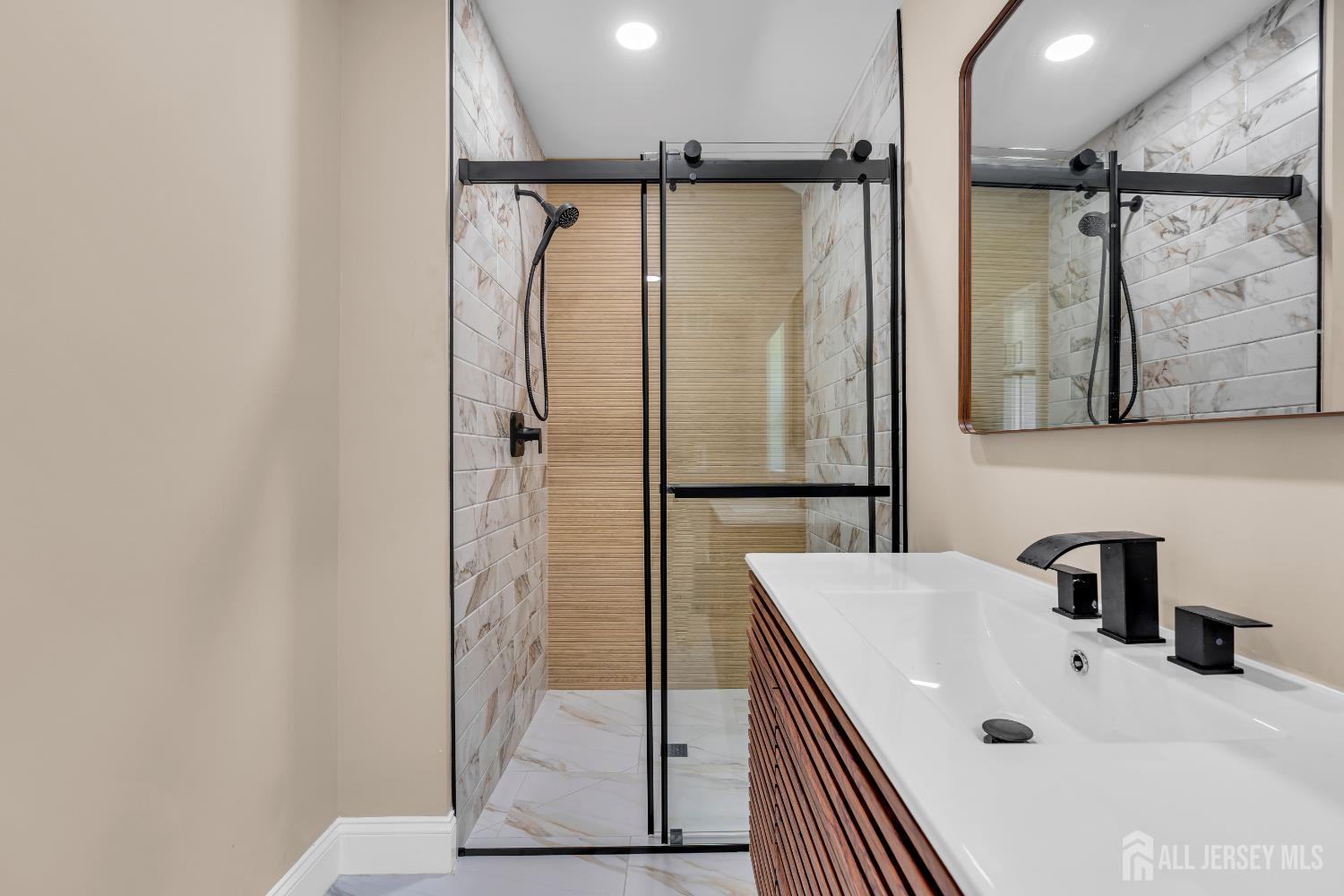 21 Harrison Avenue Englishtown, NJ 07726 - Photo 18 of 34 a bathroom with a tub and a shower