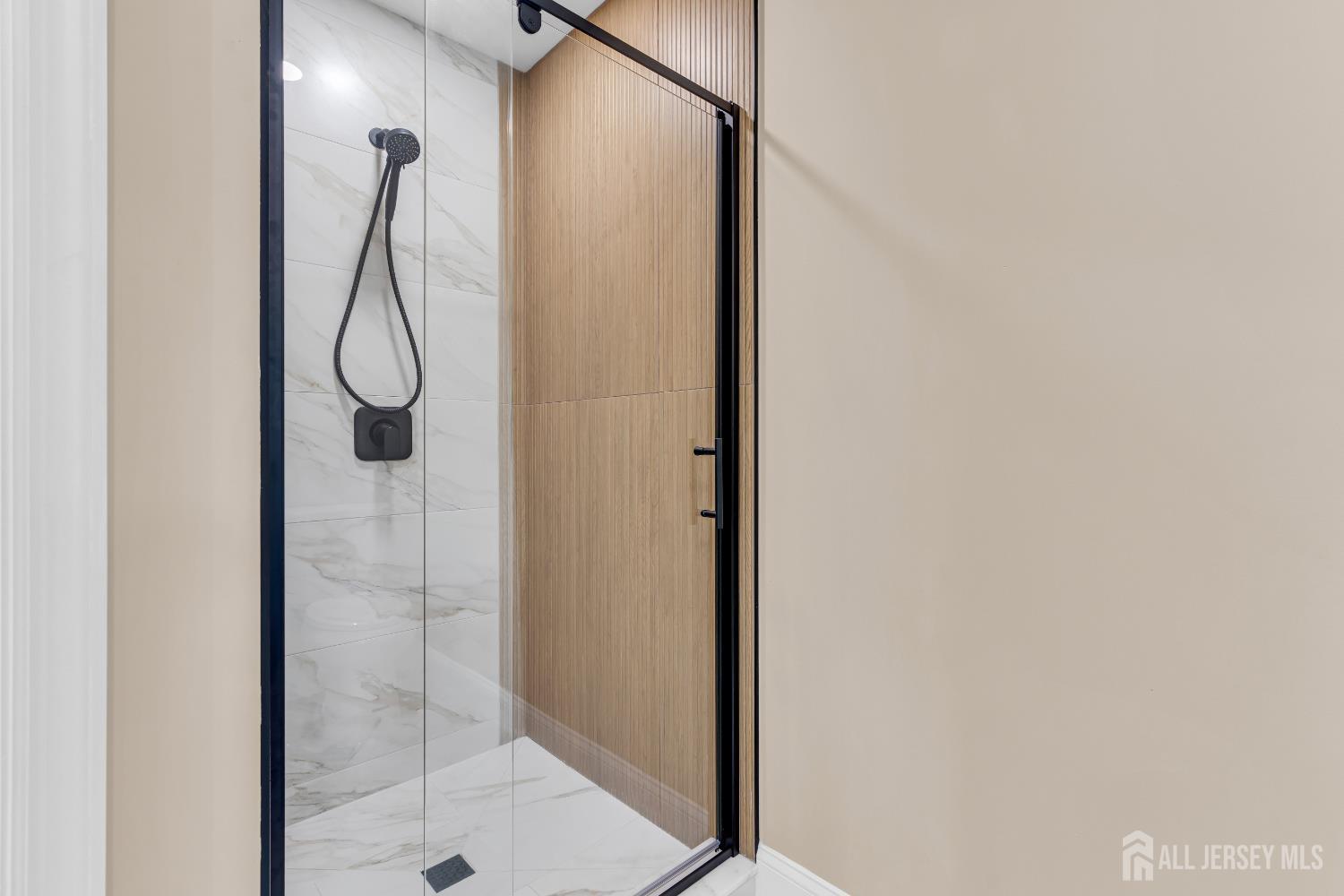 21 Harrison Avenue Englishtown, NJ 07726 - Photo 21 of 34 a bathroom with a glass shower door
