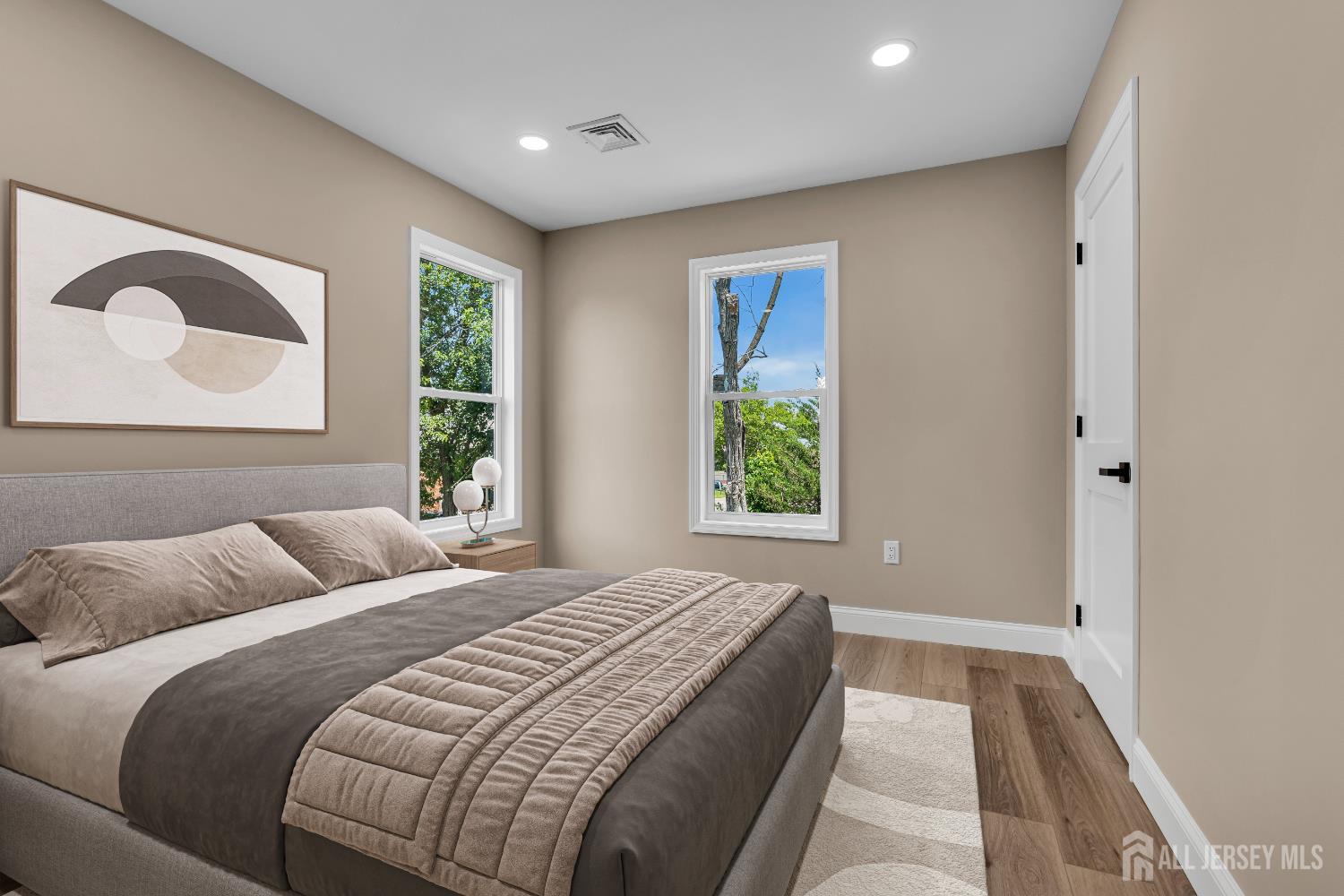 21 Harrison Avenue Englishtown, NJ 07726 - Photo 25 of 34 a bedroom with a bed and a large window