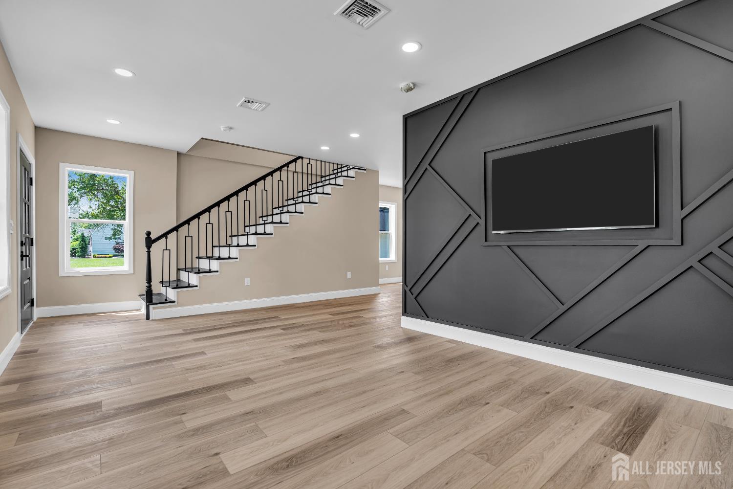 21 Harrison Avenue Englishtown, NJ 07726 - Photo 6 of 34 a view of an entryway with wooden floor