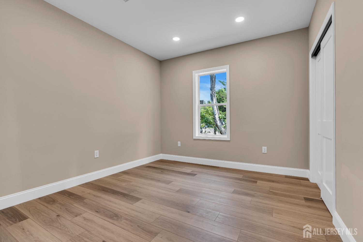 21 Harrison Avenue Englishtown, NJ 07726 - Photo 8 of 34 wooden floor in an empty room with a window