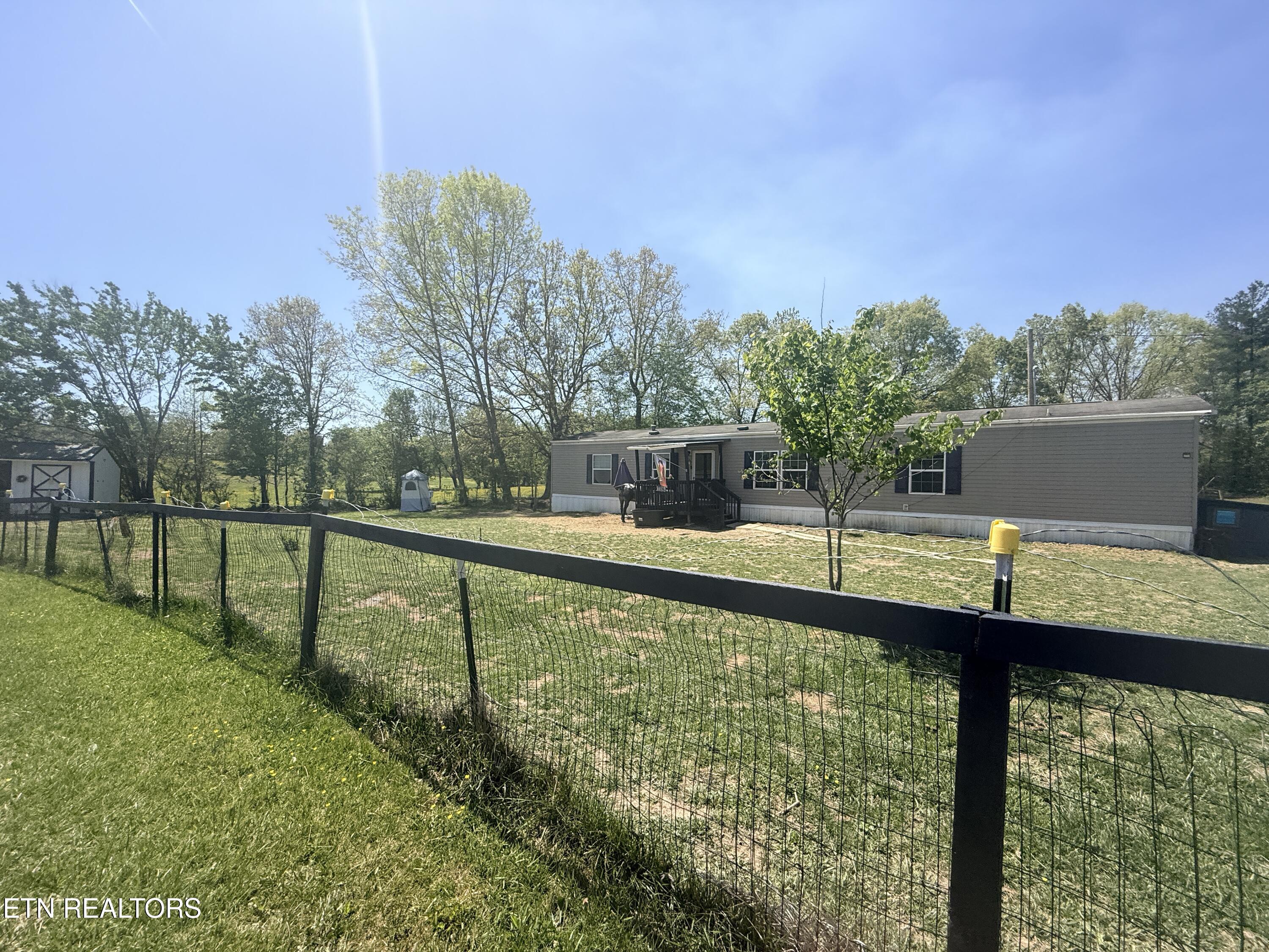 174 Claude Howard Road Deer Lodge, TN 37726 - Photo 2 of 44 IMG_3828