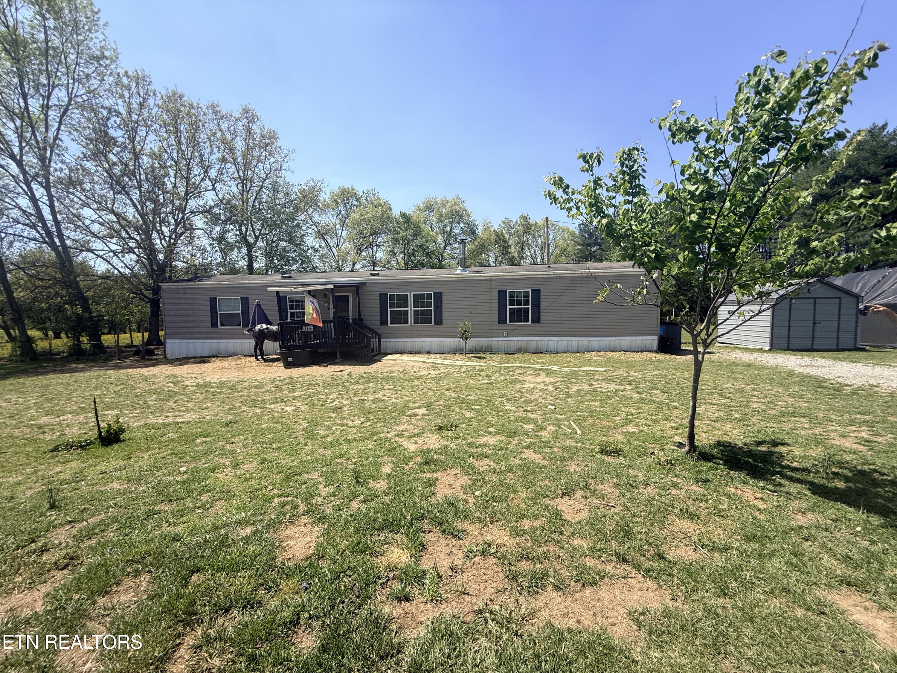 174 Claude Howard Road Deer Lodge, TN 37726 - Photo 4 of 44 IMG_3863
