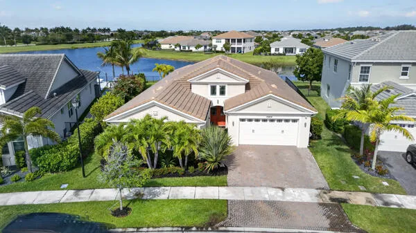 an aerial view of a house with a garden