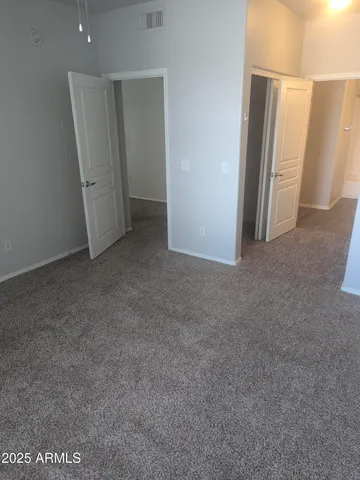 a view of a room with racks on the wall