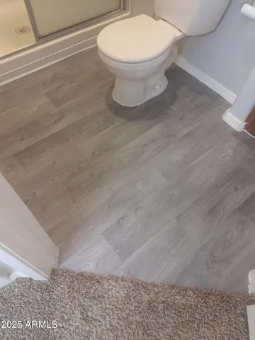 a bathroom with a sink and vanity