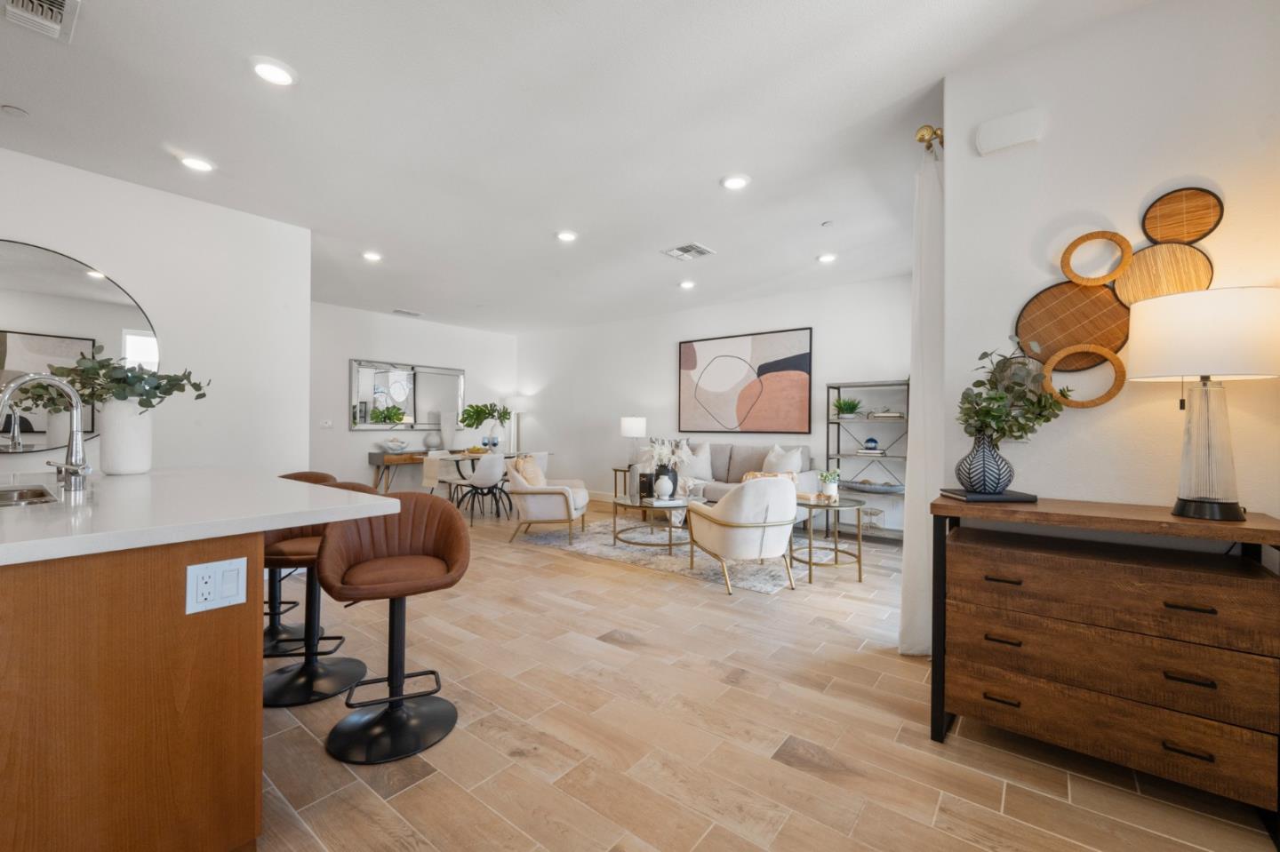 39447 Finial Common Fremont, CA 94539 - Photo 19 of 48 a living room with furniture and a chandelier