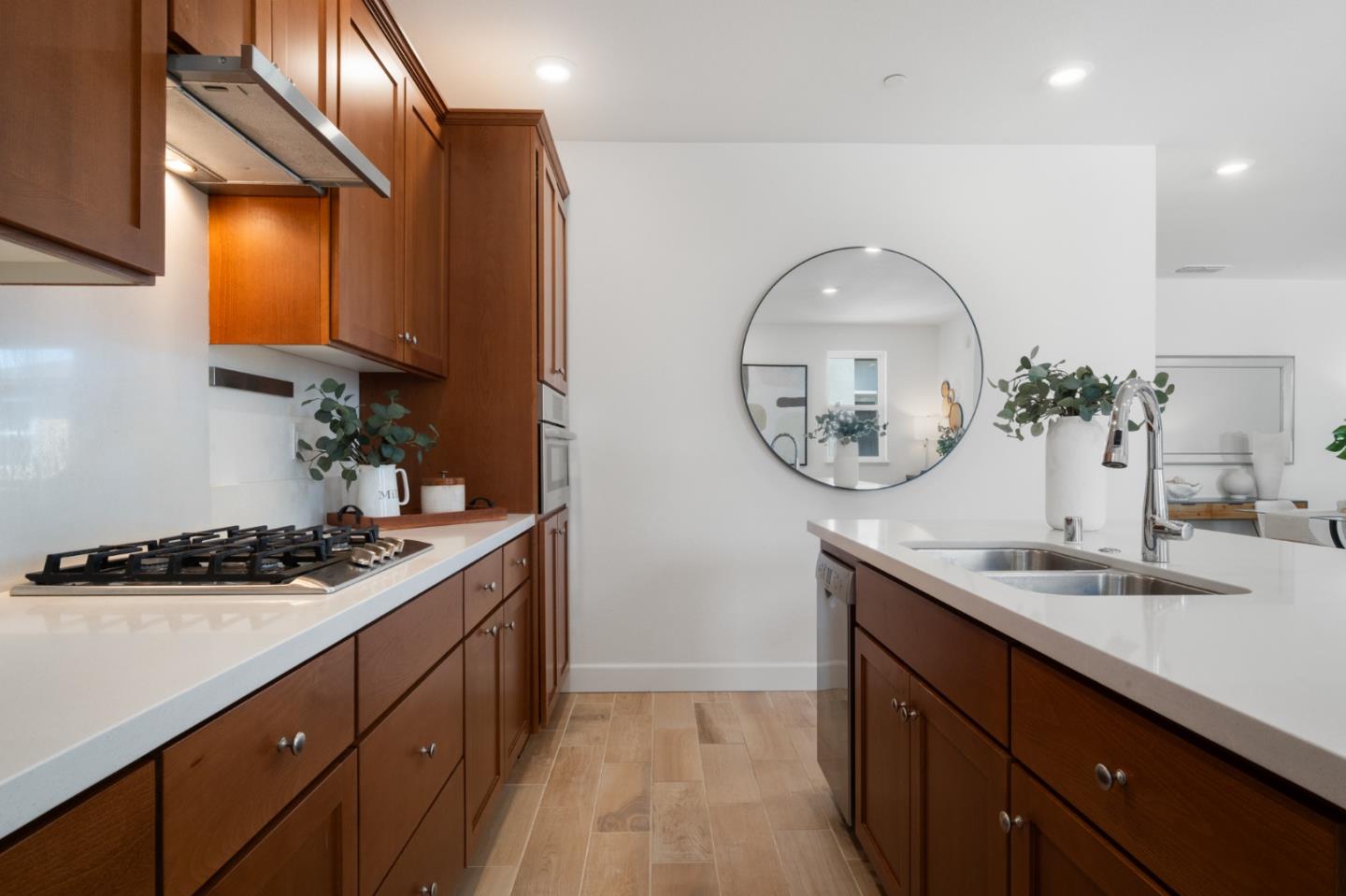 39447 Finial Common Fremont, CA 94539 - Photo 20 of 48 a kitchen with a sink and a stove