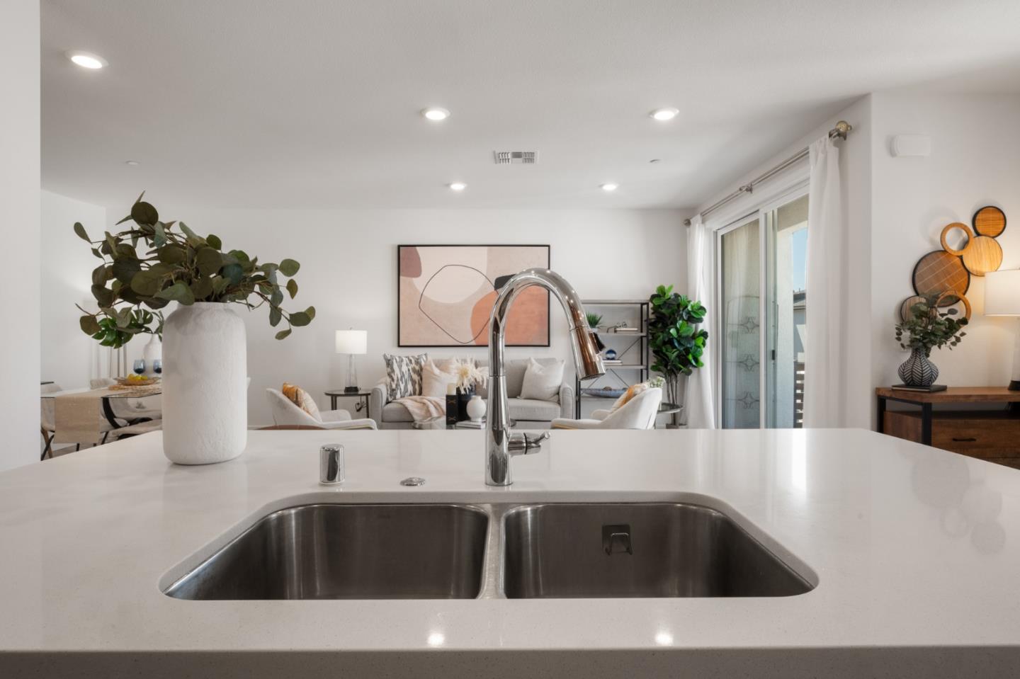 39447 Finial Common Fremont, CA 94539 - Photo 22 of 48 a kitchen with a sink and potted plant