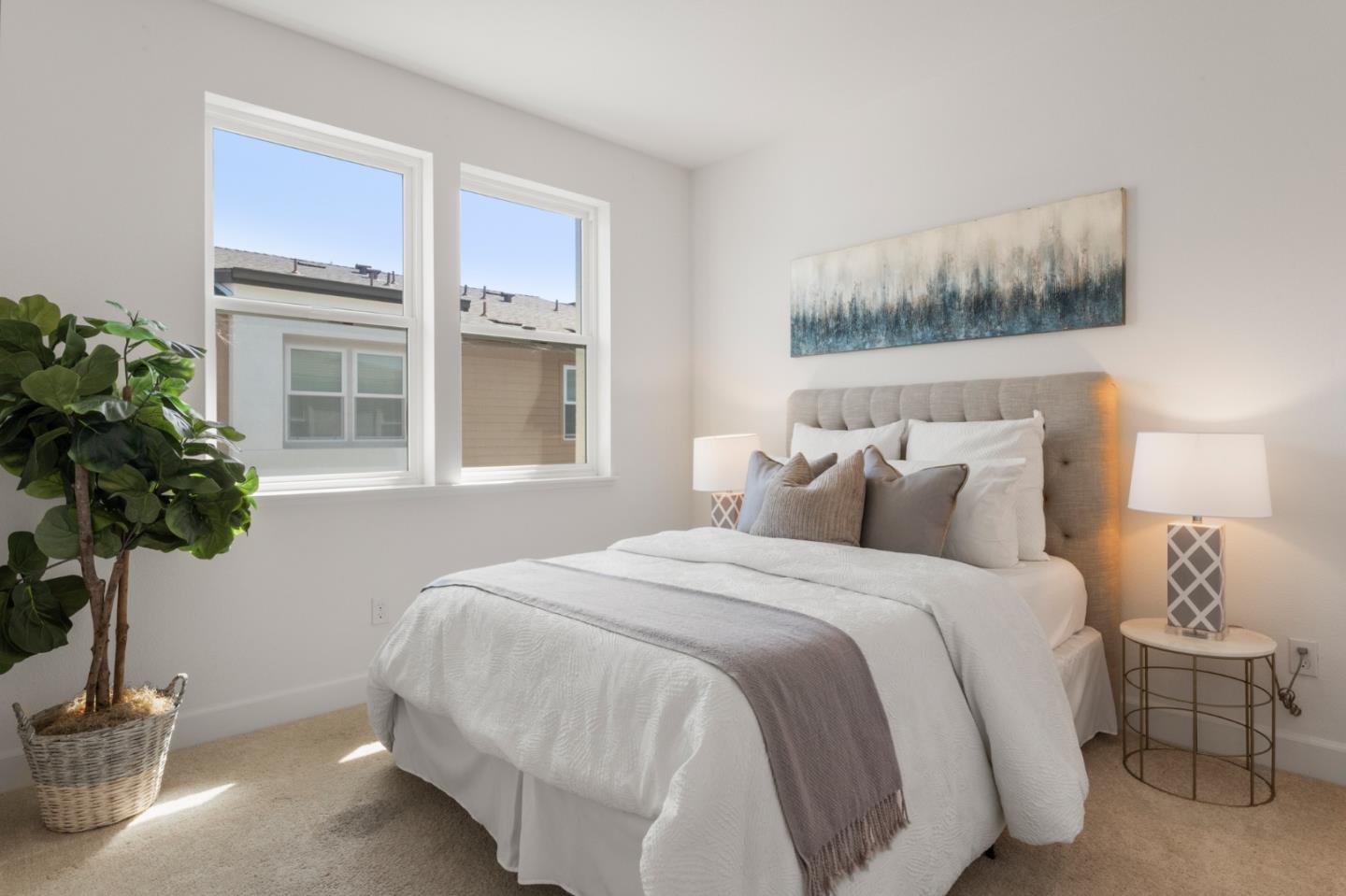 39447 Finial Common Fremont, CA 94539 - Photo 24 of 48 a bed sitting in a bedroom next to a window