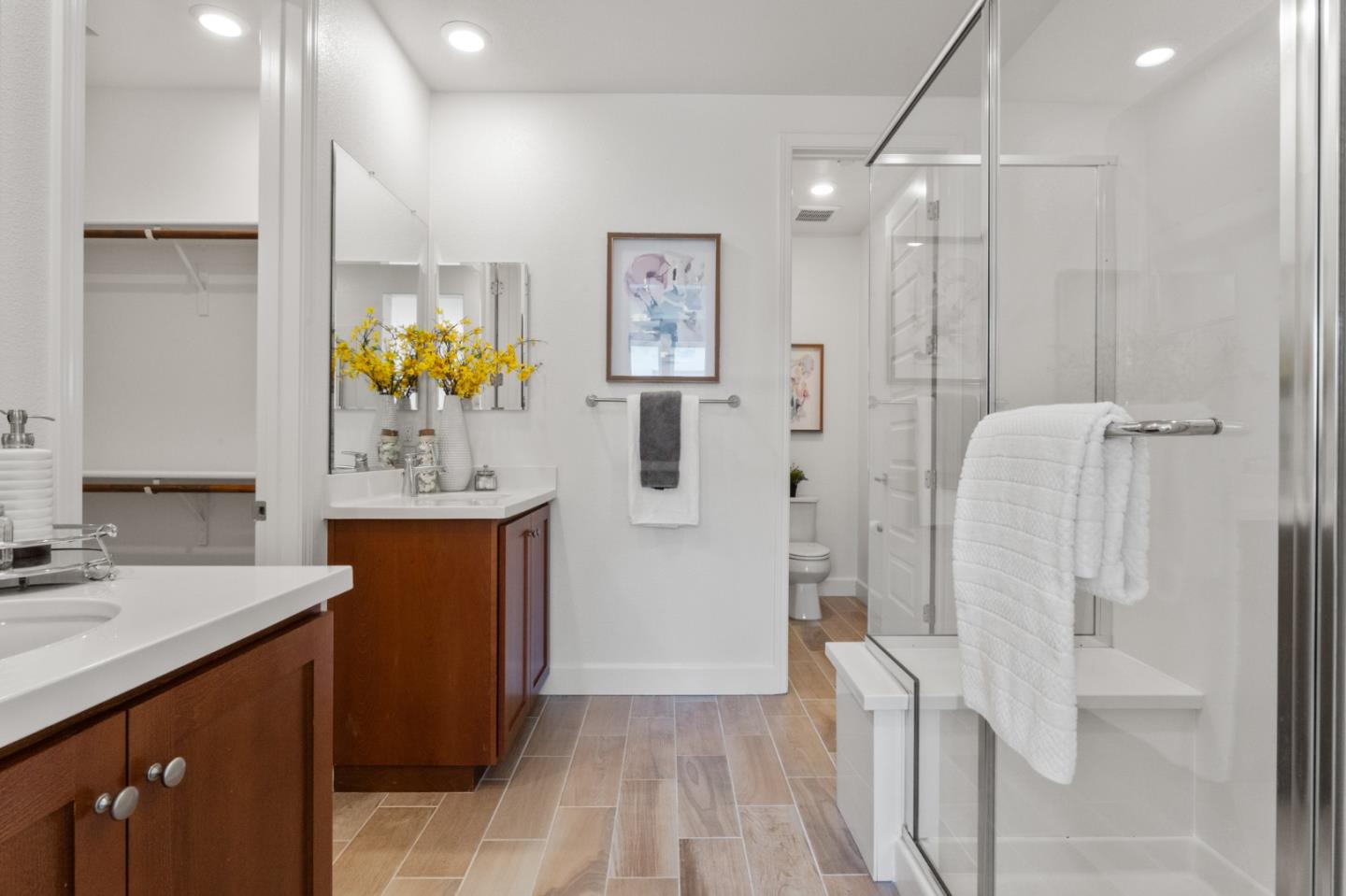 39447 Finial Common Fremont, CA 94539 - Photo 26 of 48 a bathroom with a sink a vanity and a mirror