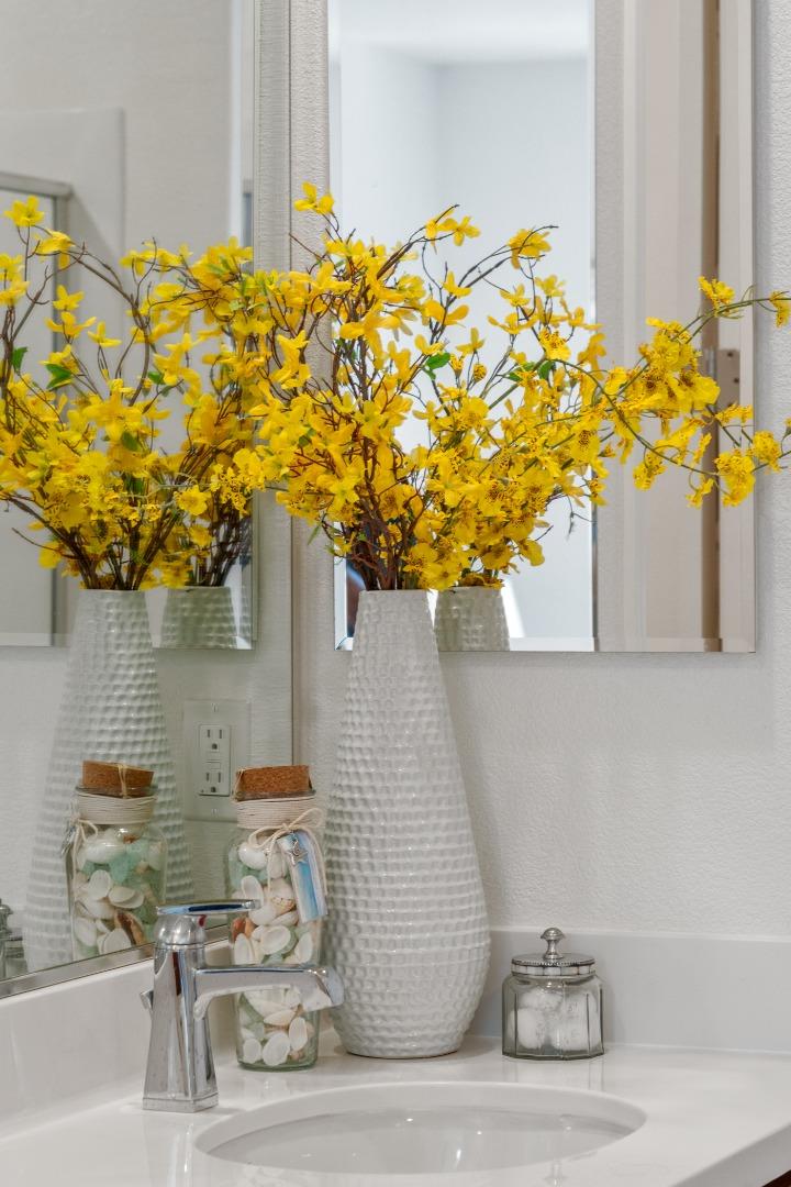 39447 Finial Common Fremont, CA 94539 - Photo 33 of 48 a vase of flowers sitting on a table