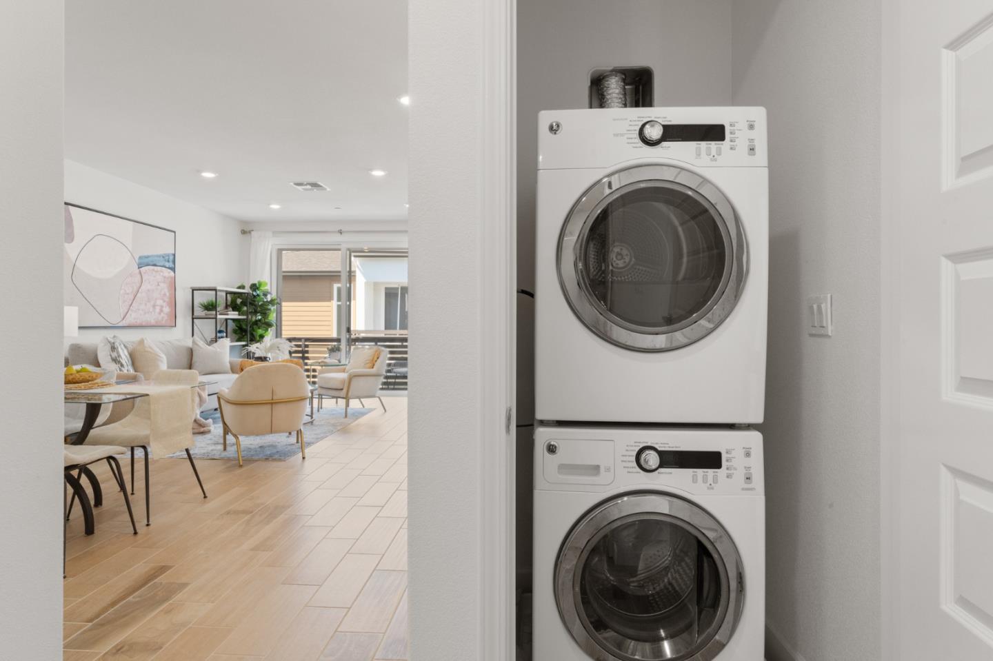 39447 Finial Common Fremont, CA 94539 - Photo 35 of 48 a view of a living room with washer and dryer