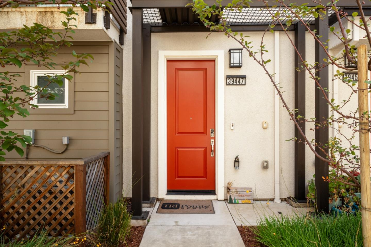 39447 Finial Common Fremont, CA 94539 - Photo 4 of 48 a front view of a house with a door and a window