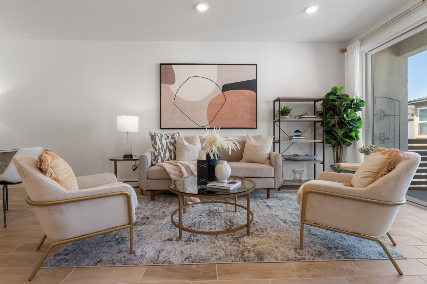 39447 Finial Common Fremont, CA 94539 - Photo 8 of 48 a living room with furniture a rug and a lamp