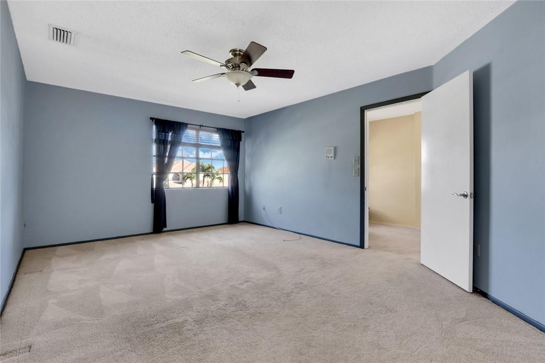 22933 Old Inlet Bridge Drive Boca Raton, FL 33433 - Photo 19 of 26 a view of an empty room with a window