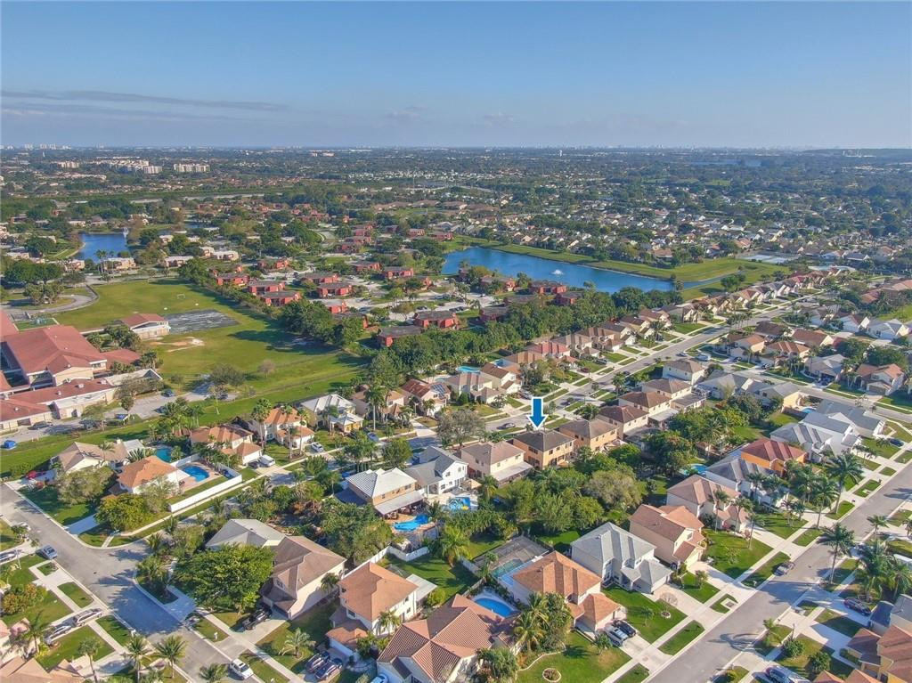 22933 Old Inlet Bridge Drive Boca Raton, FL 33433 - Photo 7 of 26 an aerial view of residential houses with outdoor space