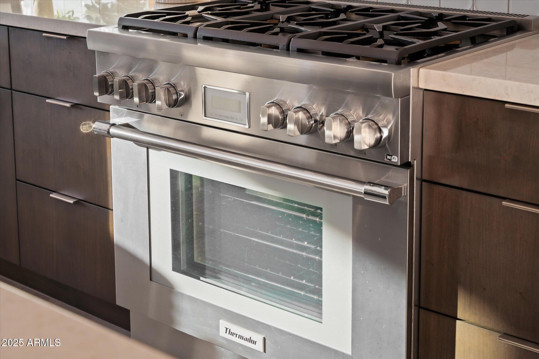19108 East Tonto Verde Drive Rio Verde, AZ 85263 - Photo 11 of 46 a close view of stove top oven