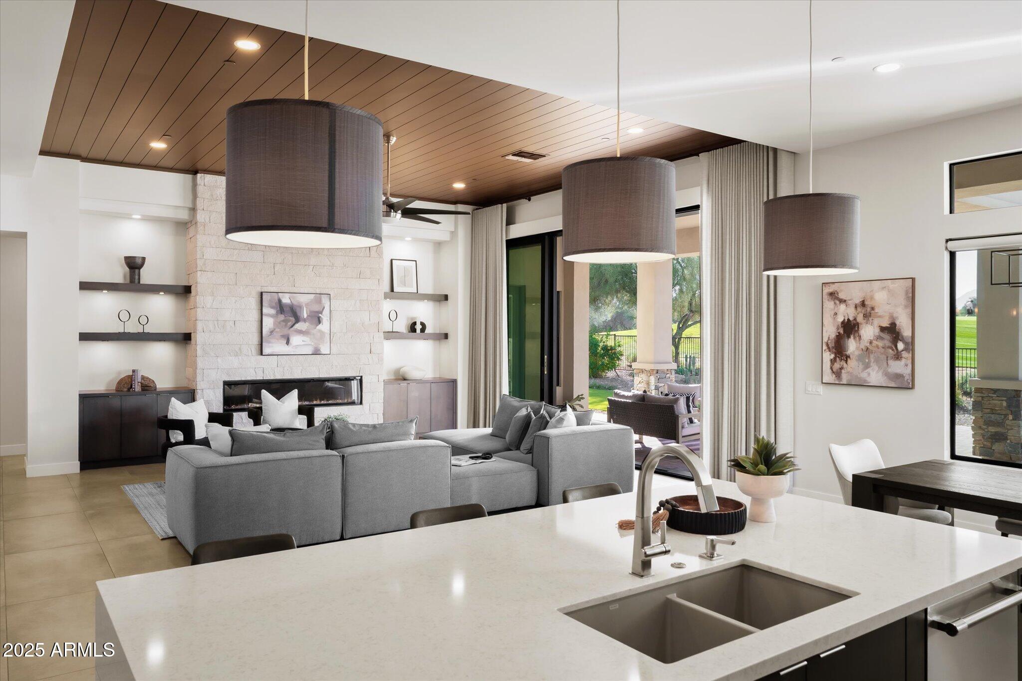 19108 East Tonto Verde Drive Rio Verde, AZ 85263 - Photo 12 of 46 a living room with furniture and kitchen view