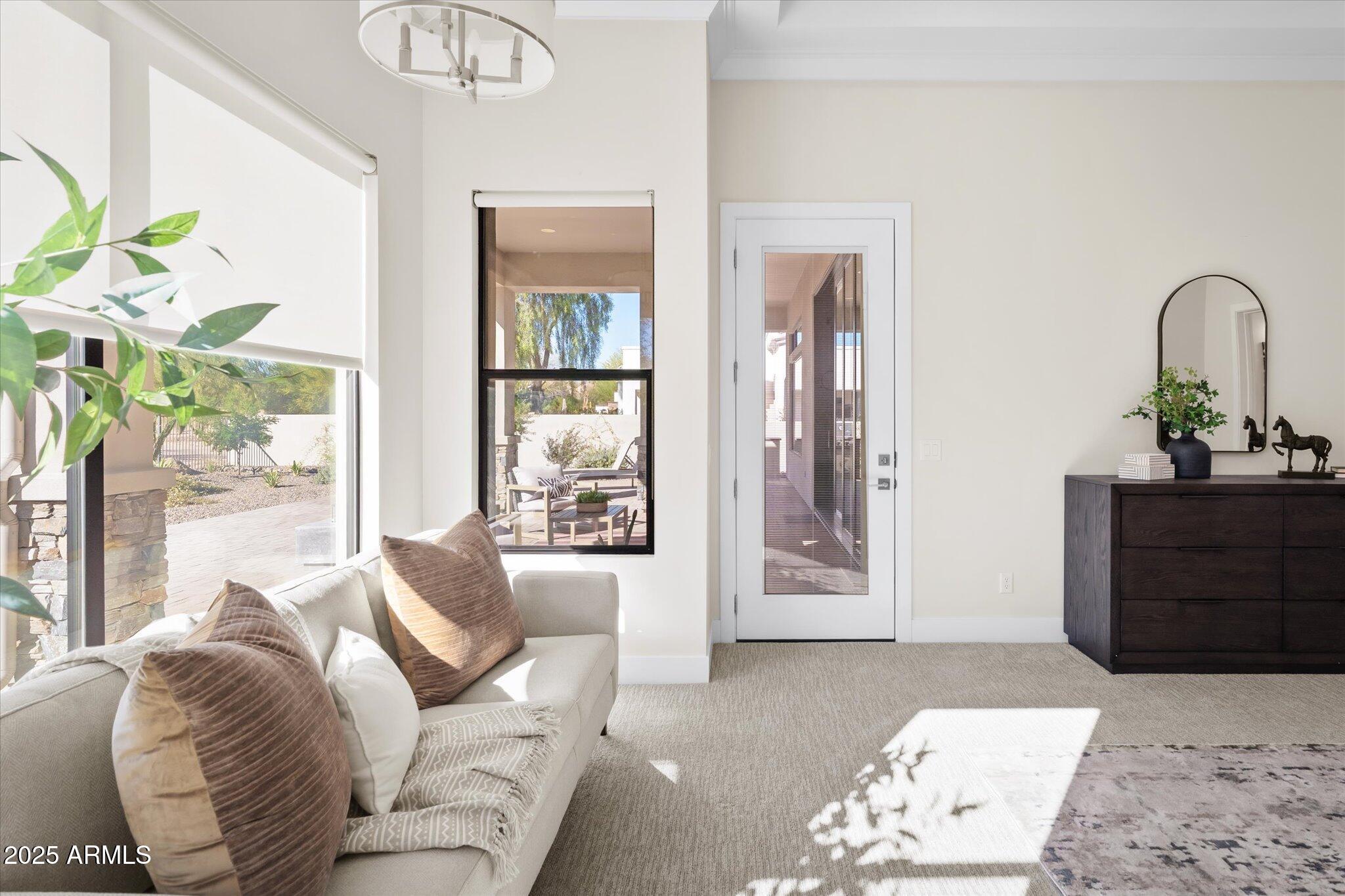 19108 East Tonto Verde Drive Rio Verde, AZ 85263 - Photo 21 of 46 a living room with furniture flowerpot and a window