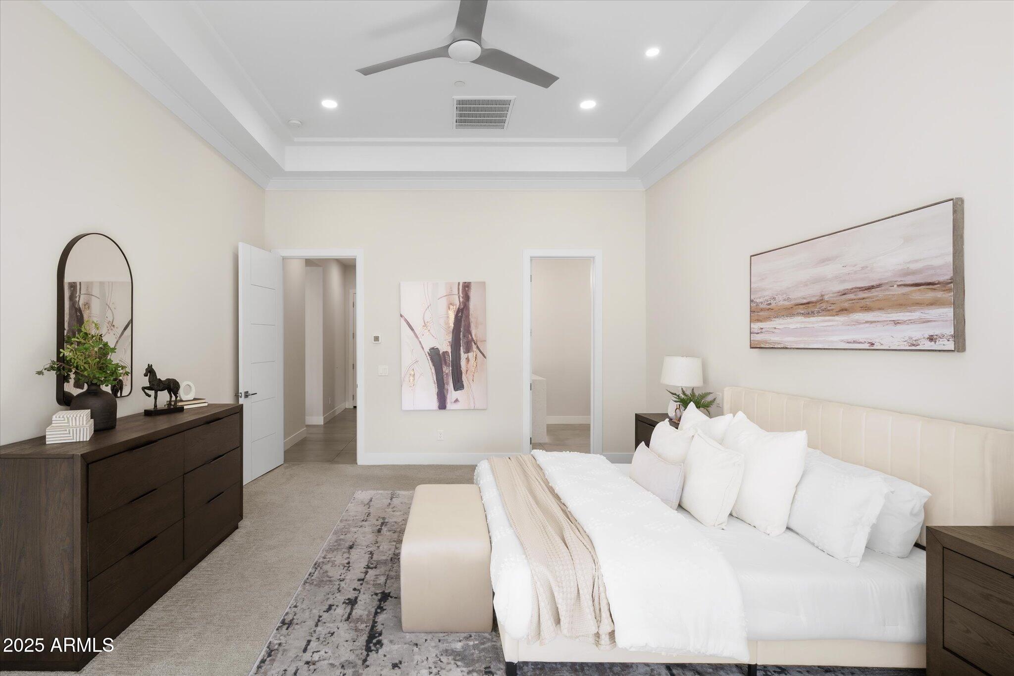 19108 East Tonto Verde Drive Rio Verde, AZ 85263 - Photo 22 of 46 a bedroom with a bed and a large mirror