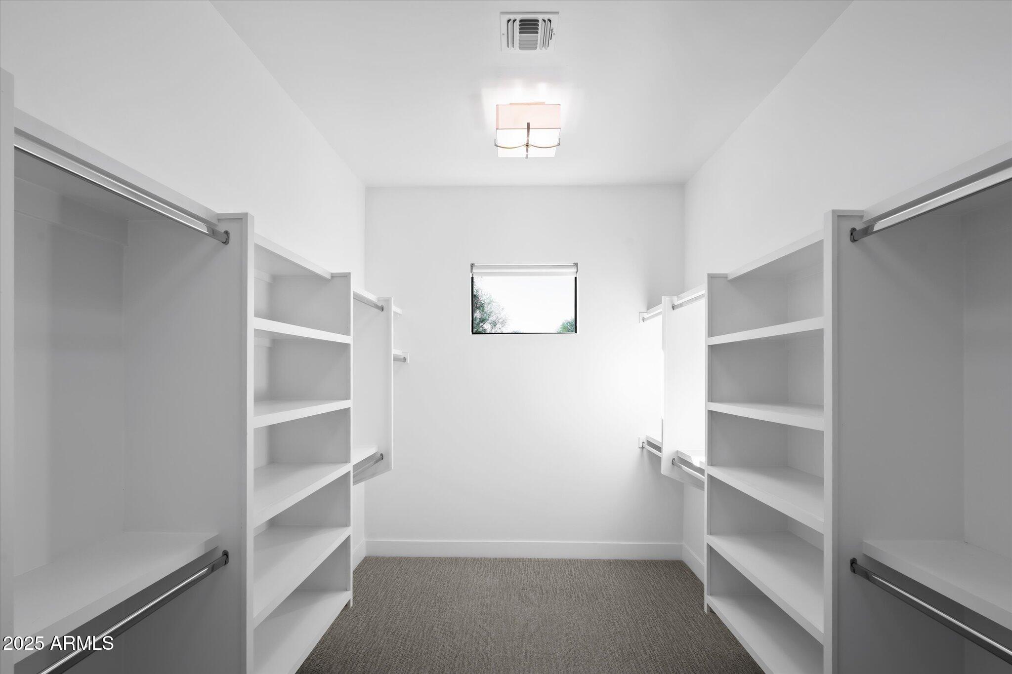 19108 East Tonto Verde Drive Rio Verde, AZ 85263 - Photo 27 of 46 a view of an empty walk in closet