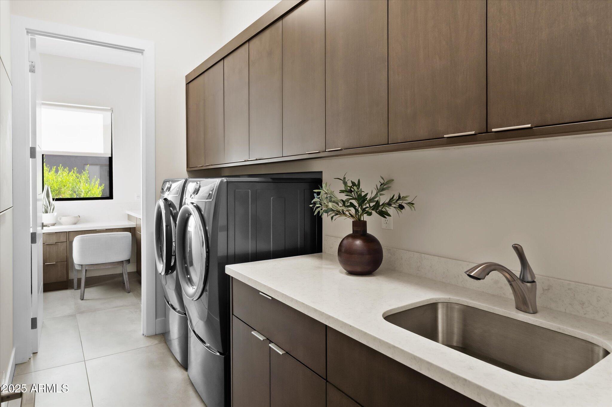 19108 East Tonto Verde Drive Rio Verde, AZ 85263 - Photo 28 of 46 a kitchen with a refrigerator and a sink