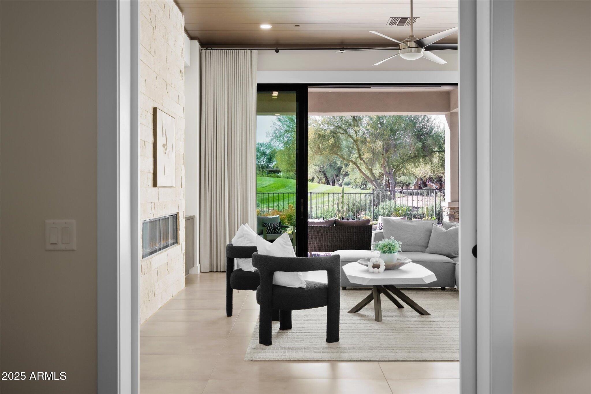 19108 East Tonto Verde Drive Rio Verde, AZ 85263 - Photo 33 of 46 a living room with furniture and a window