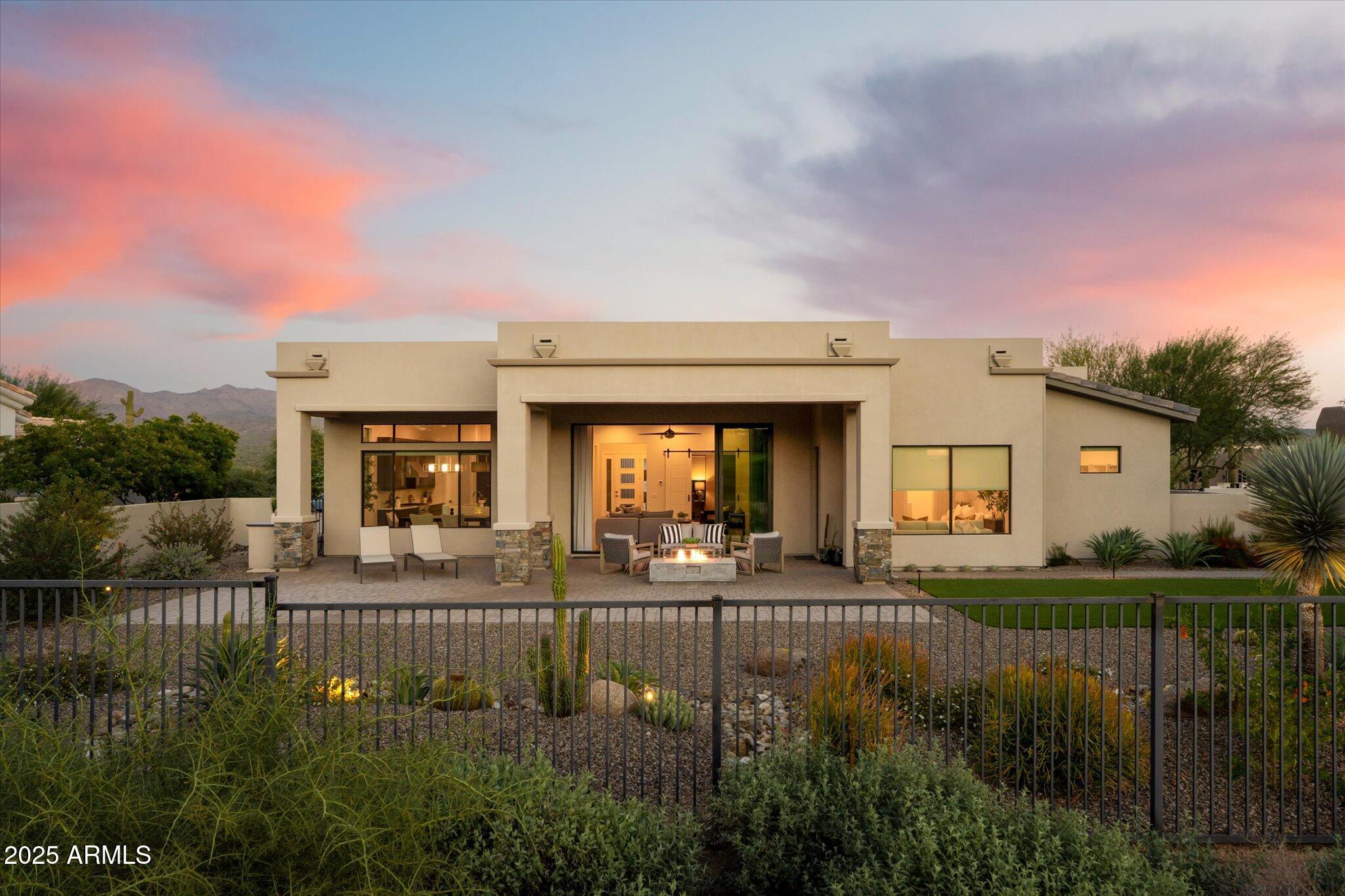 19108 East Tonto Verde Drive Rio Verde, AZ 85263 - Photo 37 of 46 a view of a house with a yard and balcony