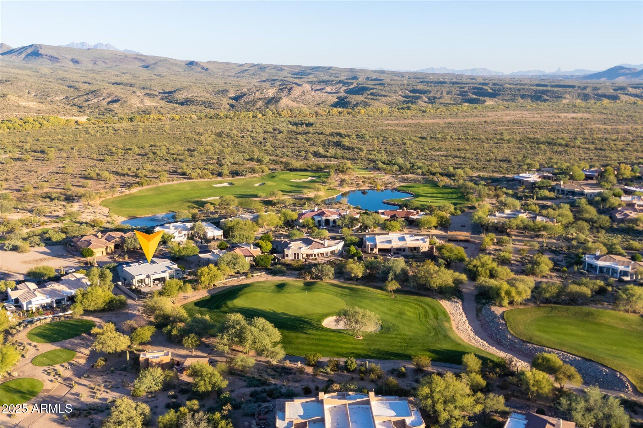 19108 East Tonto Verde Drive Rio Verde, AZ 85263 - Photo 42 of 46 an aerial view of residential houses with outdoor space and swimming pool