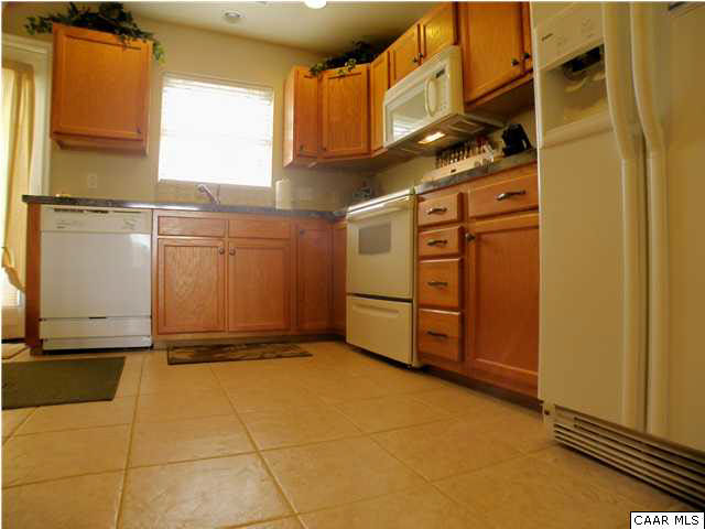 6899 Spring Hill Road Ruckersville, VA 22968 - Photo 13 of 32 a view of a refrigerator and window
