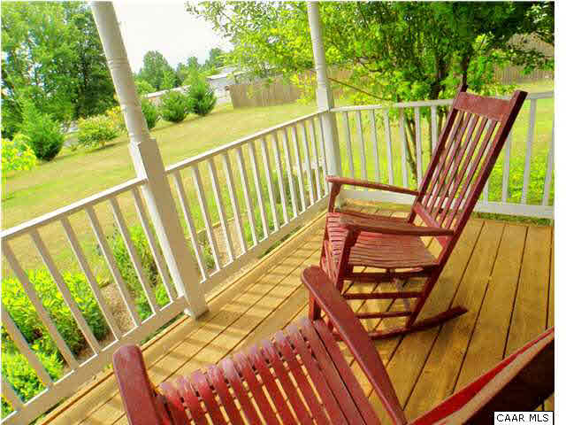 6899 Spring Hill Road Ruckersville, VA 22968 - Photo 9 of 32 a view of a two chairs on the deck