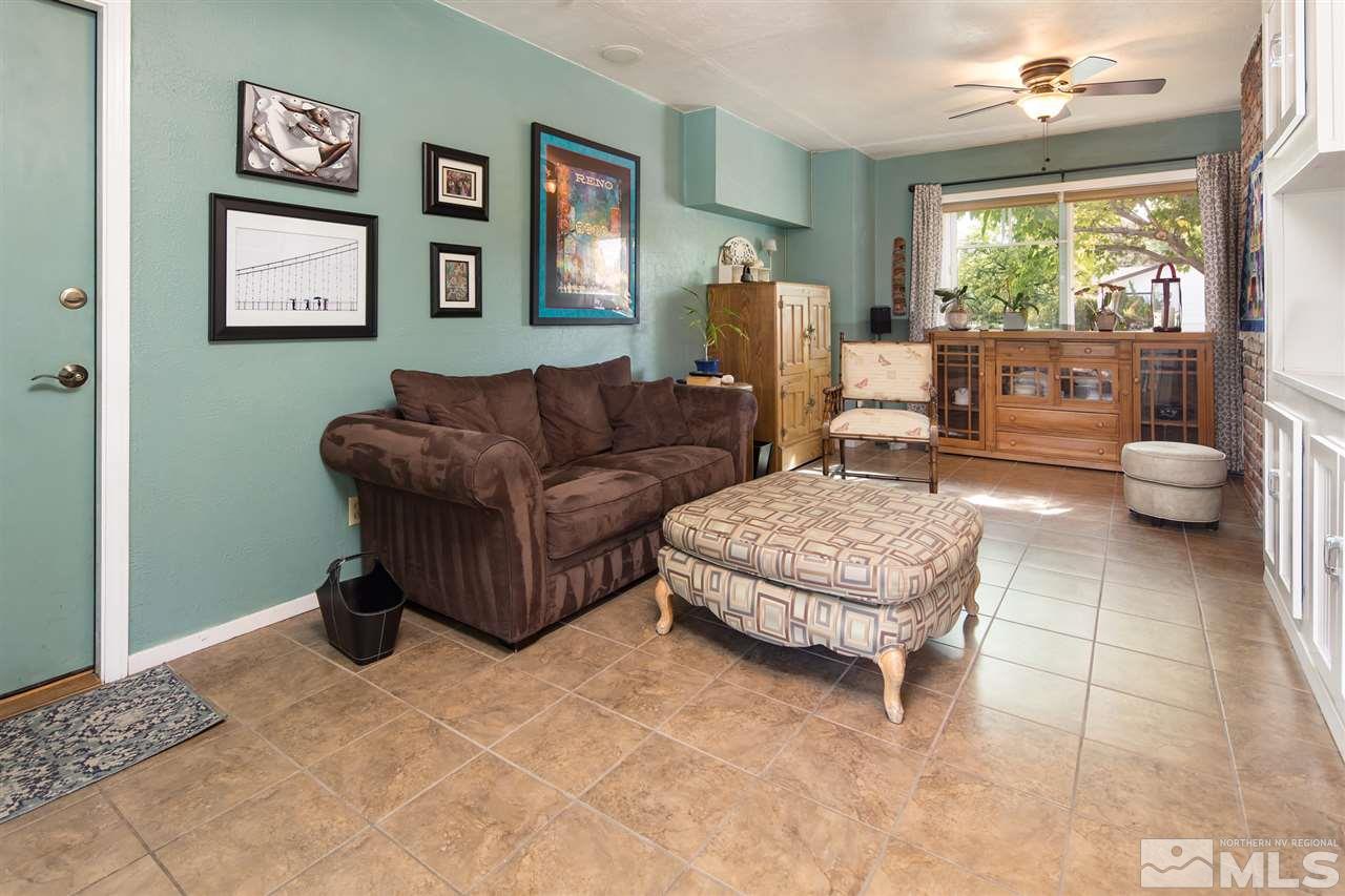 1775 Allen Street Reno, NV 89509 - Photo 15 of 25 a living room with furniture and a large window