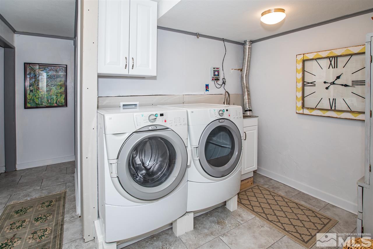 1775 Allen Street Reno, NV 89509 - Photo 19 of 25 a utility room with sink dryer and washer