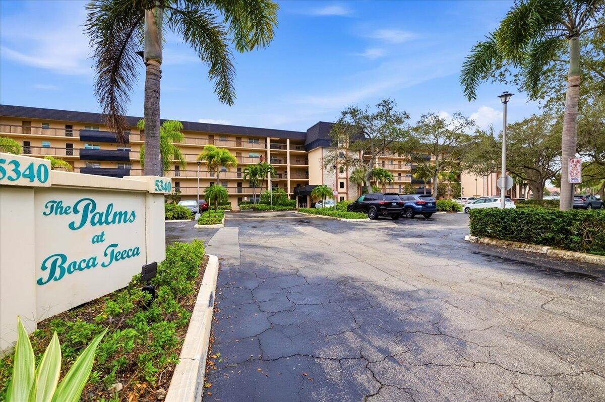 5340 Northwest 2nd Avenue, Unit 323 Boca Raton, FL 33487 - Photo 2 of 21 a view of outdoor space with sign board
