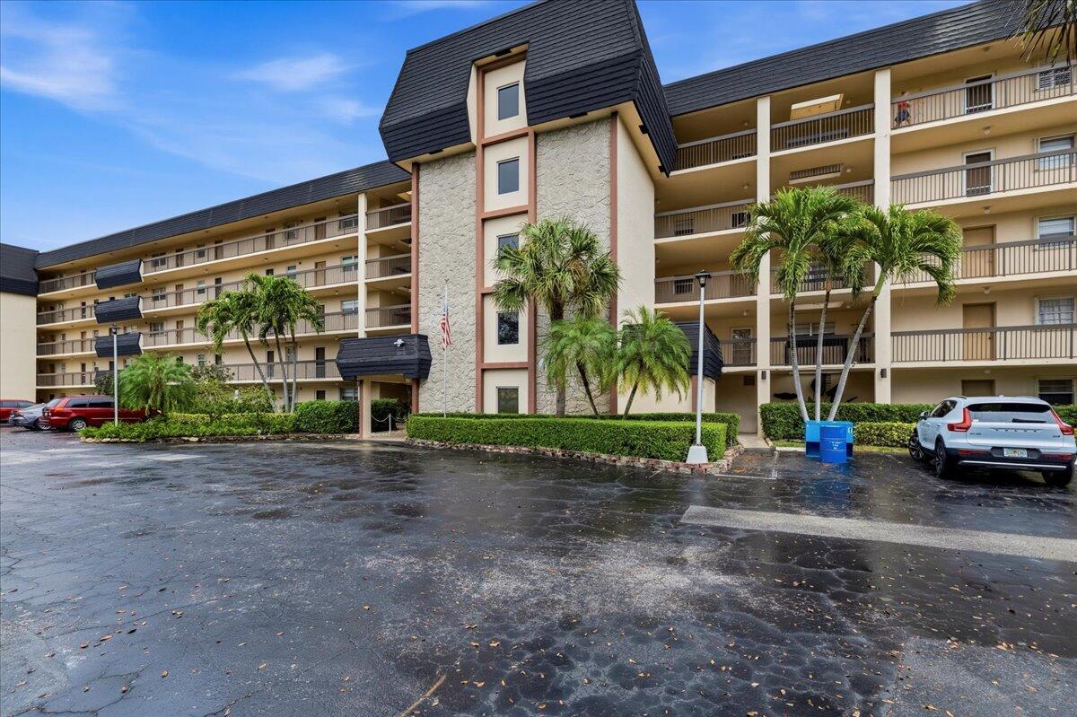 5340 Northwest 2nd Avenue, Unit 323 Boca Raton, FL 33487 - Photo 21 of 21 a view of a building with a street