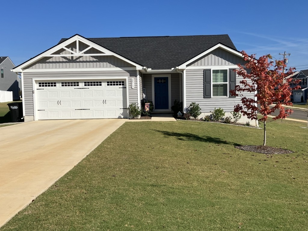 2315 Burnwick Grove Spring Hill, TN 37174 - Photo 1 of 13 a front view of a house with a yard and garage