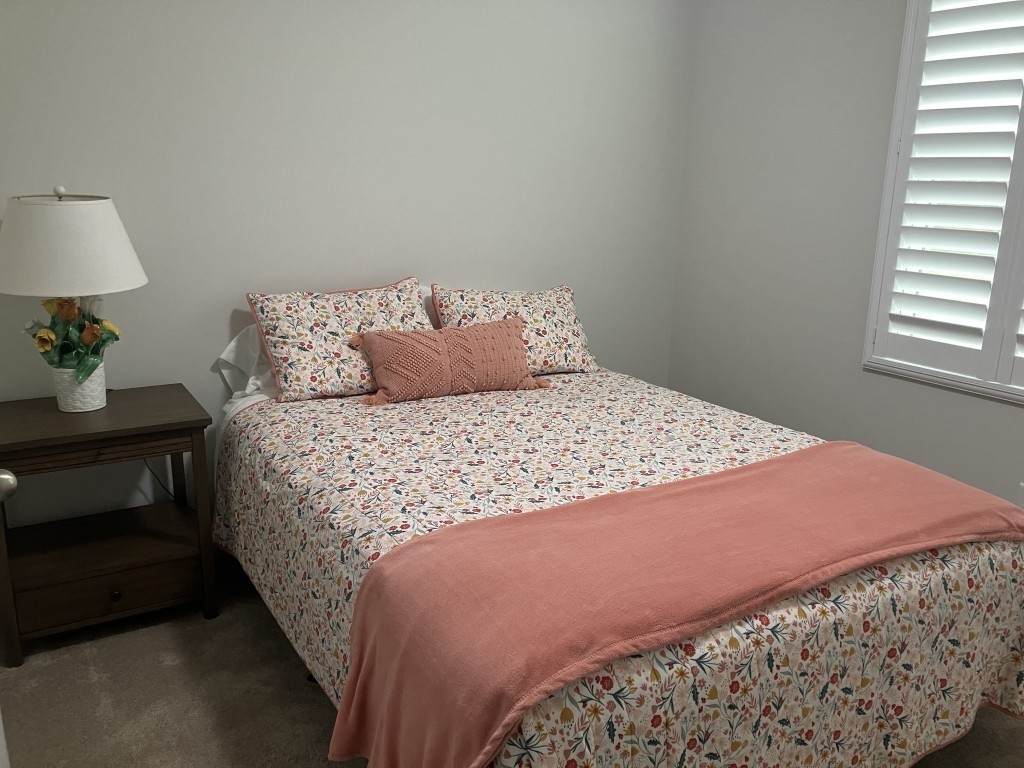 2315 Burnwick Grove Spring Hill, TN 37174 - Photo 11 of 13 a large bed sitting in a bedroom next to a window