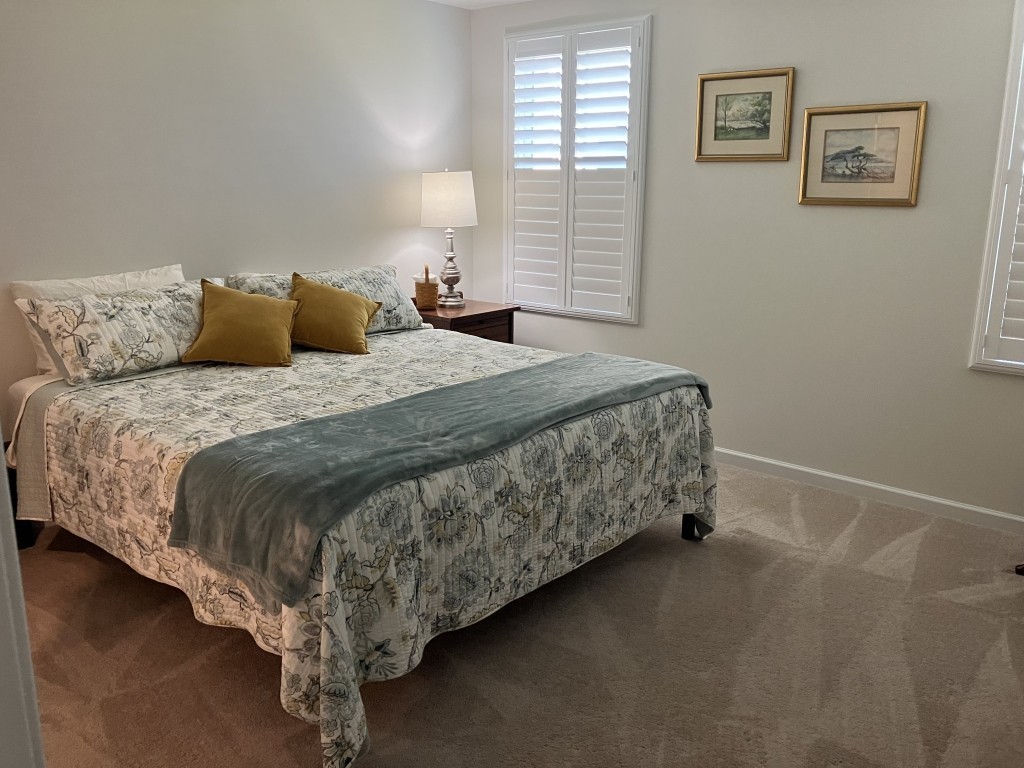 2315 Burnwick Grove Spring Hill, TN 37174 - Photo 6 of 13 a bed sitting in a bedroom next to a window