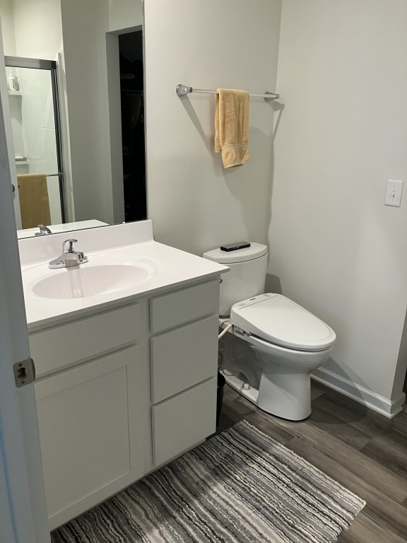 2315 Burnwick Grove Spring Hill, TN 37174 - Photo 8 of 13 a bathroom with a toilet sink and mirror