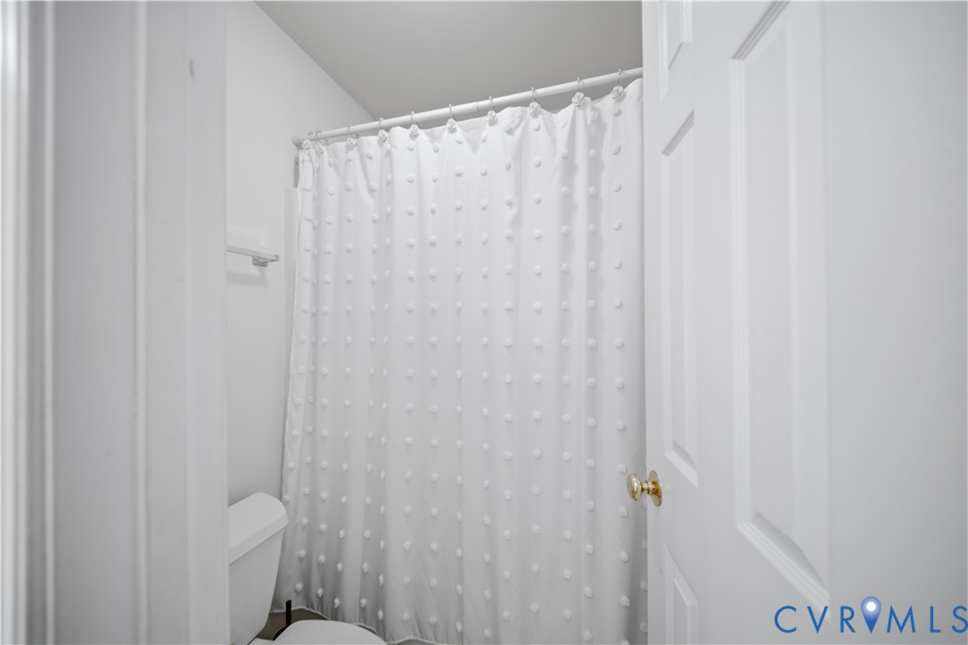 5815 Springfield Farm Lane Mineral, VA 23117 - Photo 17 of 41 Bathroom with a shower with curtain