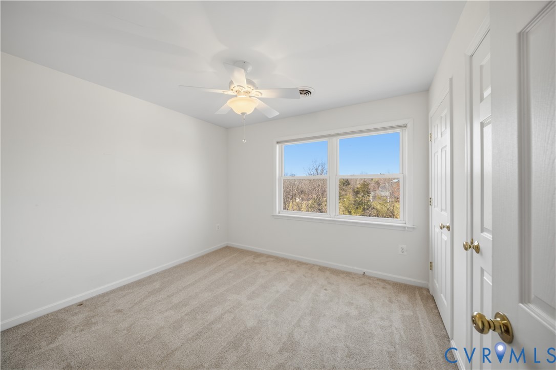 5815 Springfield Farm Lane Mineral, VA 23117 - Photo 19 of 41 Unfurnished bedroom featuring light carpet and cei