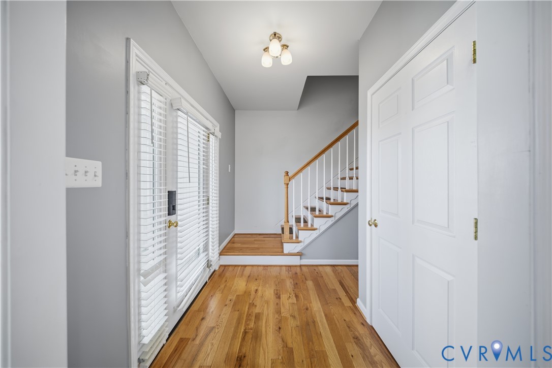 5815 Springfield Farm Lane Mineral, VA 23117 - Photo 2 of 41 Foyer with stairway and light wood finished floors