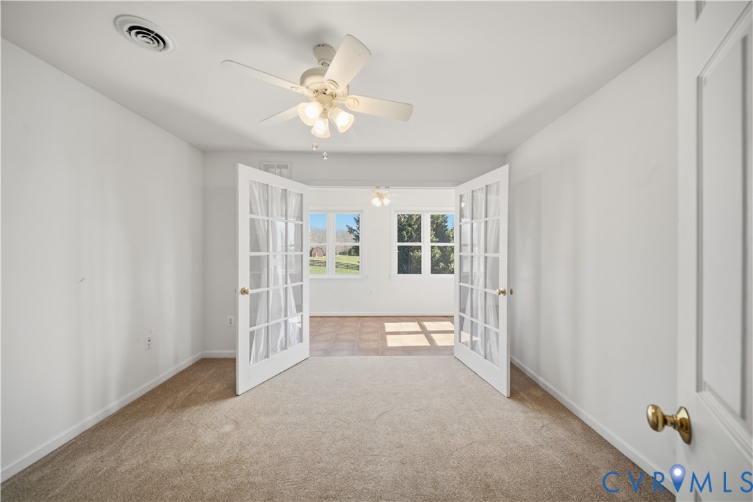 5815 Springfield Farm Lane Mineral, VA 23117 - Photo 22 of 41 Unfurnished room featuring french doors and ceilin