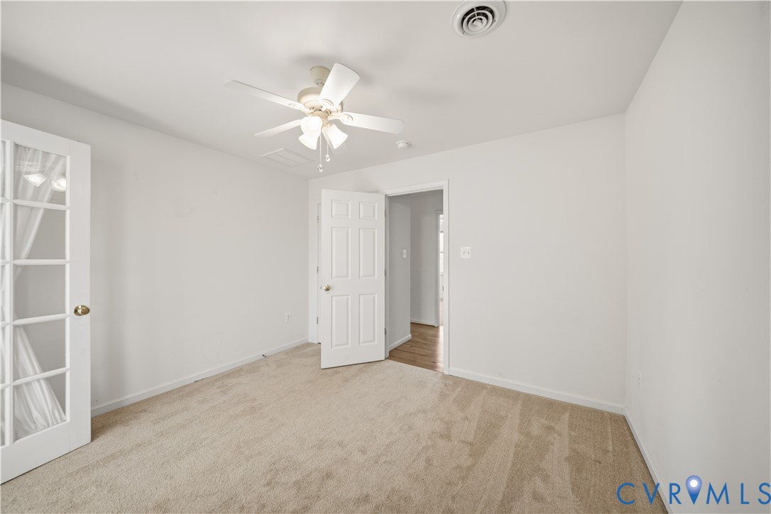 5815 Springfield Farm Lane Mineral, VA 23117 - Photo 23 of 41 Unfurnished bedroom with light carpet and a ceilin