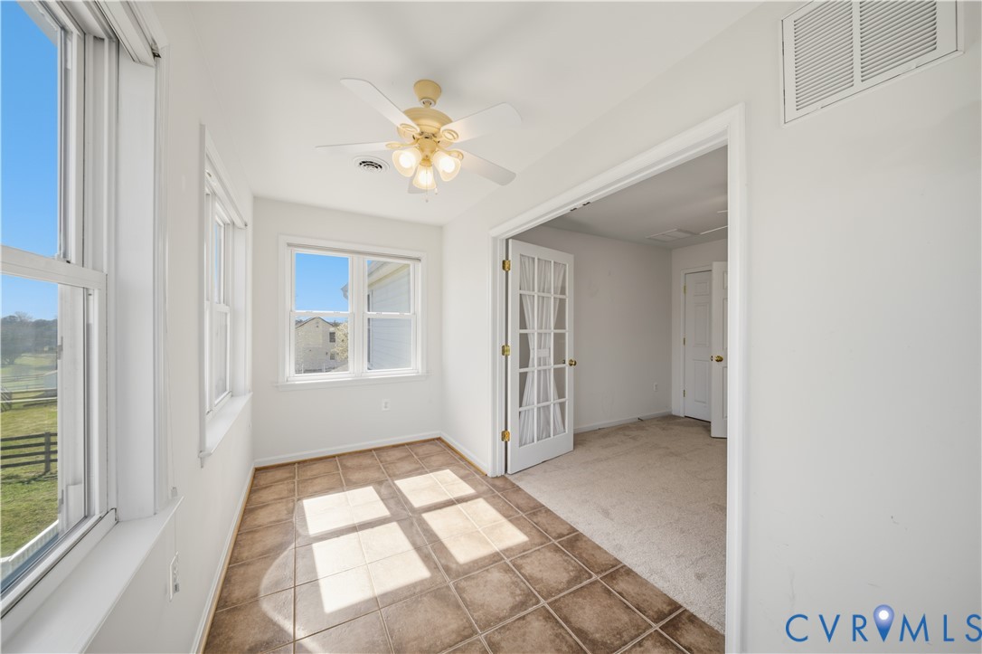 5815 Springfield Farm Lane Mineral, VA 23117 - Photo 24 of 41 Spare room featuring light carpet and ceiling fan