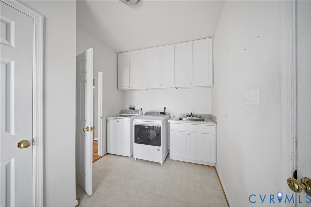 5815 Springfield Farm Lane Mineral, VA 23117 - Photo 26 of 41 Laundry room featuring light flooring, cabinet spa